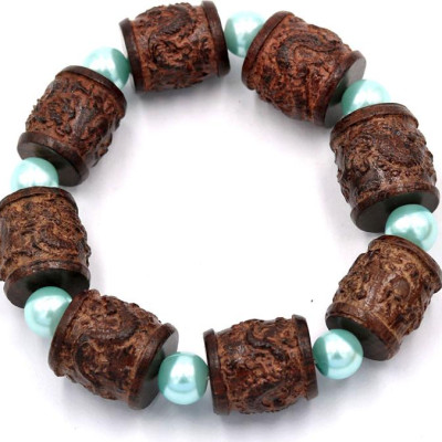 Vòng tay chuỗi hạt trụ rồng gỗ đàn hương TRNT14