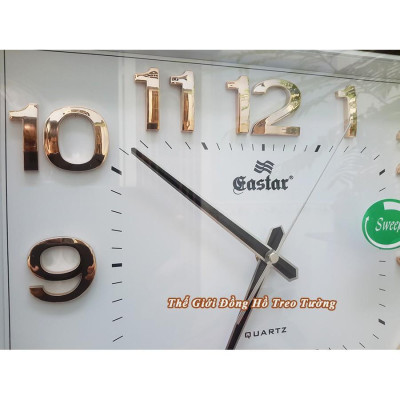 Đồng hồ Treo tường EASTAR KIM TRÔI Chữ Nhật Mặt Trắng – Mặt Kính 3D – Bộ Số Nổi Ánh Kim Bạc – Tặng Pin Maxell
