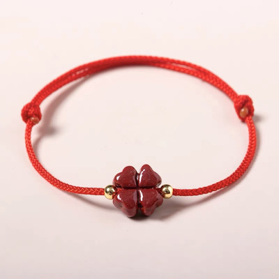 VÒNG TAY DÂY ĐỎ CỎ 4 LÁ CHU SA MAY MẮN TRONG CUỘC SỐNG