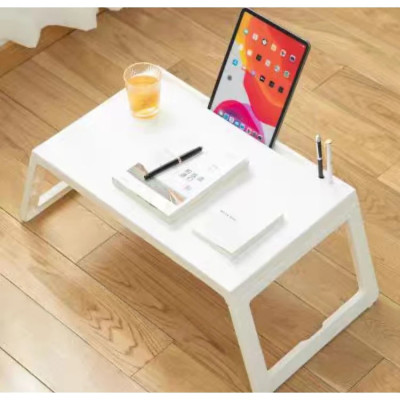 Bàn học nhựa gấp gọn  có khe cắm ipad ,bút bi ,