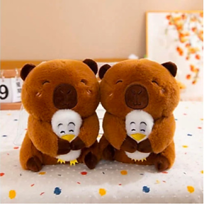Thú nhồi bông capybara ôm vịt trắng đáng yêu - Size 22cm - Quà tặng gấu bông chuột lang capybara êm mịn cho bé.