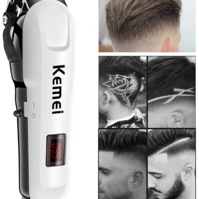 Tông đơ cắt tóc không dây Kemei KM-809A có màn hình LCD tiện dụng, có thể cắm điện trực tiếp