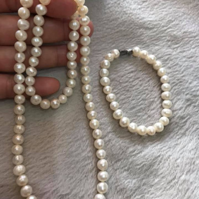 CẢ BỘ VÒNG TAY VÀ DÂY CHUỖI CHẤT LIỆU NGỌC TRAI  SIZE HƠN 7MM 