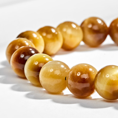 Vòng Tay Đá Mắt Hổ Vàng Tươi Phối Bàn Tay Hamsa Bạc