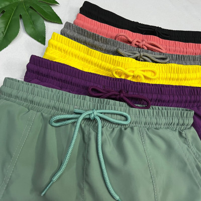 Quần Jogger Nữ Chất Vải Gió Dù Phong Cách Thể Thao